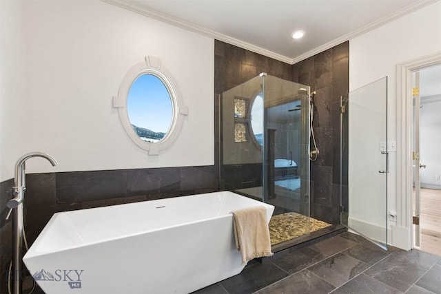 10423 Bridger Canyon Rd, Bozeman, MT 59715 - bathroom with ornamental molding, a soaking tub, a stall shower, and recessed lighting