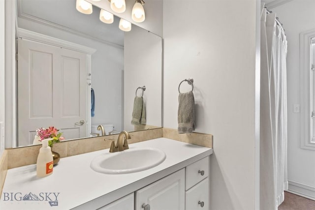10423 Bridger Canyon Rd, Bozeman, MT 59715 - full bathroom featuring vanity, ornamental molding, and a shower with curtain