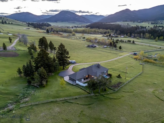 10423 Bridger Canyon Rd, Bozeman, MT 59715 - aerial view of sparsely populated area featuring a mountain backdrop and a pastoral area