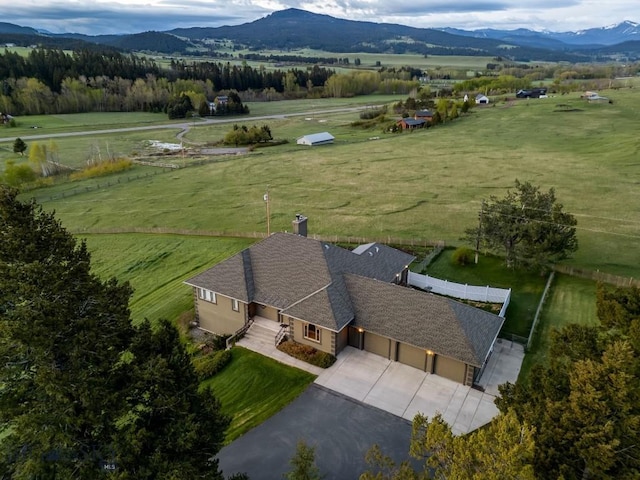 10423 Bridger Canyon Rd, Bozeman, MT 59715 - aerial view of sparsely populated area with a mountainous background and a pastoral area