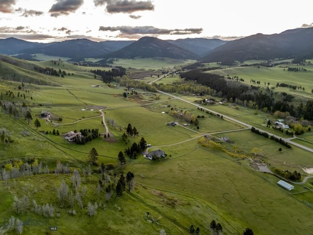 10423 Bridger Canyon Rd, Bozeman, MT 59715 - aerial view of property and surrounding area featuring rural landscape and a mountainous background
