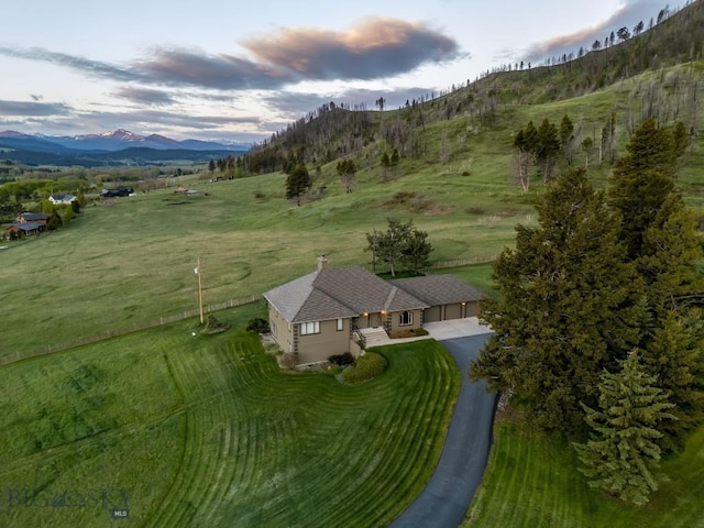 10423 Bridger Canyon Rd, Bozeman, MT 59715 - aerial view of property and surrounding area with a mountainous background