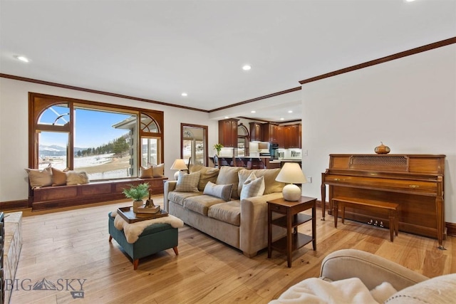 10423 Bridger Canyon Rd, Bozeman, MT 59715 - living area with ornamental molding, recessed lighting, and light wood-style floors