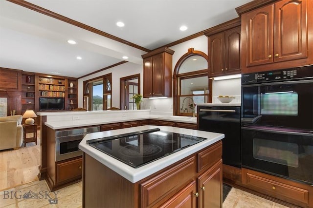 10423 Bridger Canyon Rd, Bozeman, MT 59715 - kitchen featuring black appliances, ornamental molding, light countertops, a center island, and recessed lighting