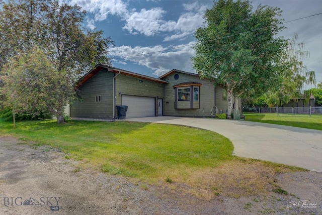 620 Higgins, Deer Lodge, MT 59722 - view of front facade featuring driveway and an attached garage