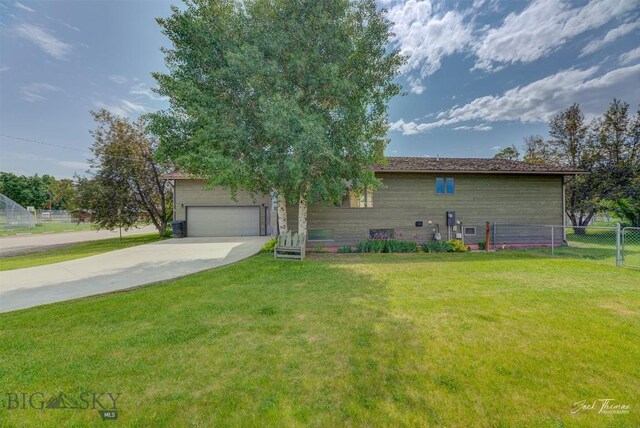620 Higgins, Deer Lodge, MT 59722 - view of front of house with concrete driveway and an attached garage