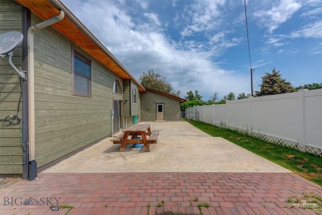 620 Higgins, Deer Lodge, MT 59722 - fenced backyard with a patio