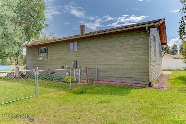 620 Higgins, Deer Lodge, MT 59722 - rear view of property with a chimney