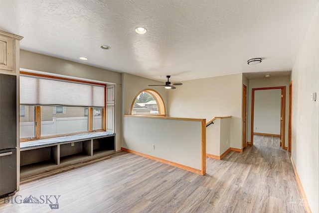 620 Higgins, Deer Lodge, MT 59722 - unfurnished room featuring light wood-style flooring, a textured ceiling, ceiling fan, and recessed lighting