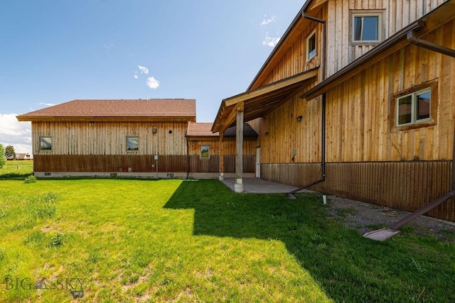241 Aspen Loop Rd, West Yellowstone, MT 59758 - view of green lawn with a patio