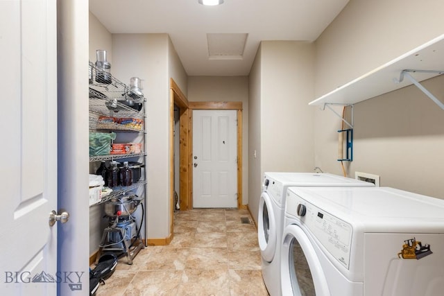 988 Meagher, Bozeman, MT 59718 - laundry area with washing machine and dryer and attic access