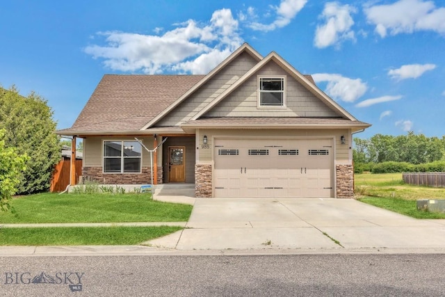 988 Meagher, Bozeman, MT 59718 - craftsman-style house with stone siding, concrete driveway, and roof with shingles
