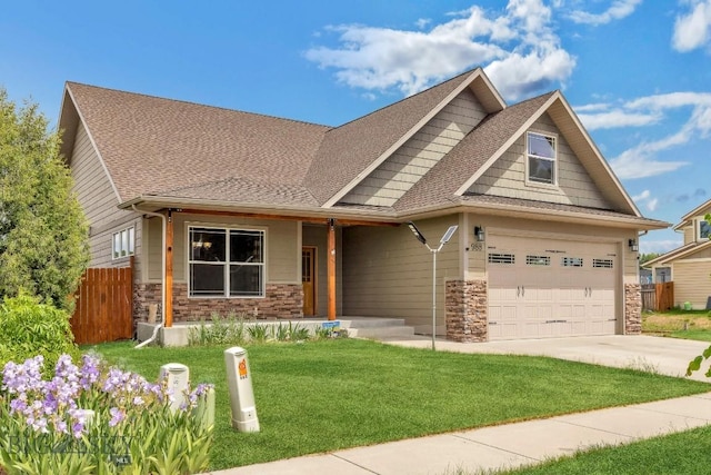 988 Meagher, Bozeman, MT 59718 - craftsman house with stone siding, concrete driveway, covered porch, and roof with shingles