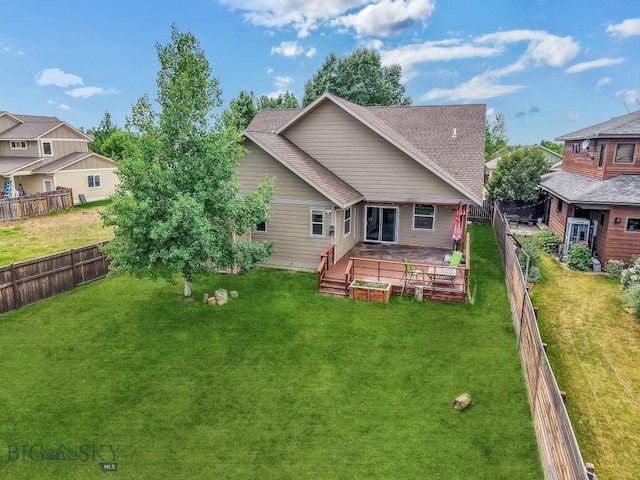 988 Meagher, Bozeman, MT 59718 - back of house with a fenced backyard and a garden