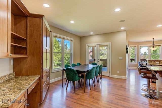 960 Strawberry, Helena, MT 59601 - dining room with wood finished floors, recessed lighting, and french doors