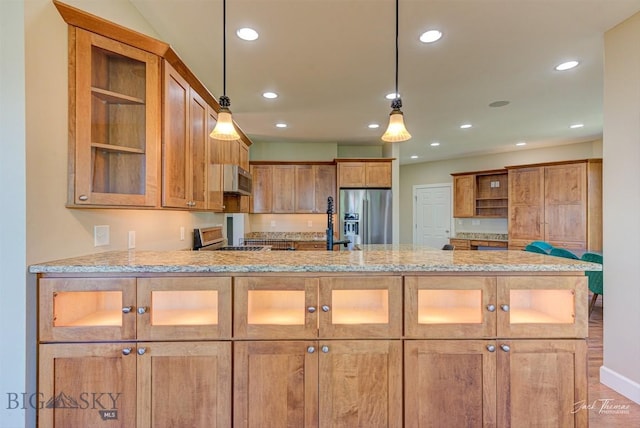 960 Strawberry, Helena, MT 59601 - kitchen with open shelves, stainless steel appliances, a peninsula, light stone countertops, and glass insert cabinets
