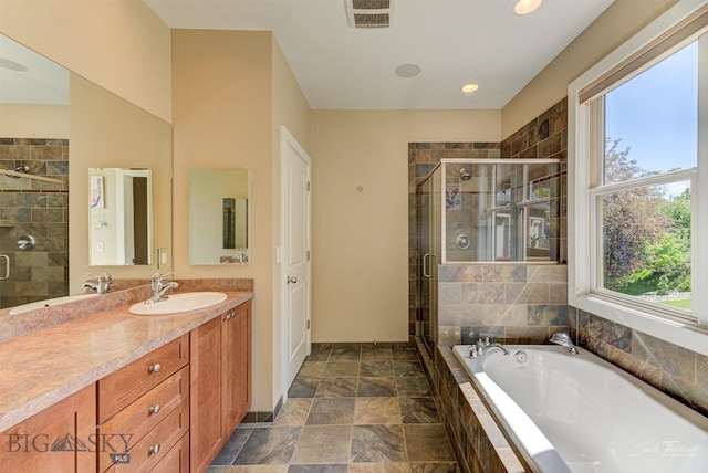 960 Strawberry, Helena, MT 59601 - full bath with a bath, plenty of natural light, a stall shower, vanity, and recessed lighting