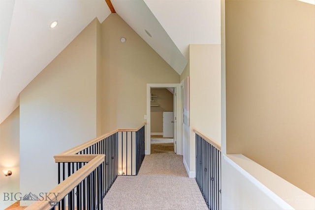 960 Strawberry, Helena, MT 59601 - hall featuring carpet, lofted ceiling, and an upstairs landing