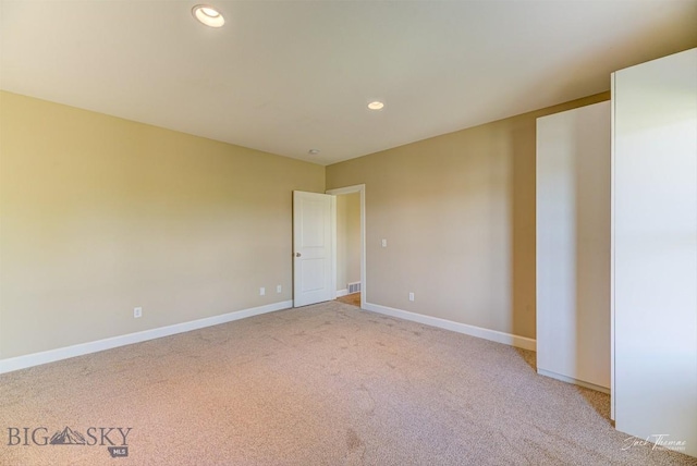 960 Strawberry, Helena, MT 59601 - spare room featuring light colored carpet and recessed lighting