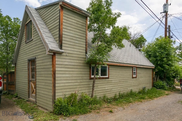 326 S 5th St, Livingston, MT 59047 - view of home's exterior featuring roof with shingles