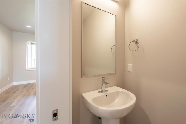 488 Meriwether Ave, Bozeman, MT 59718 - bathroom featuring wood finished floors and a sink