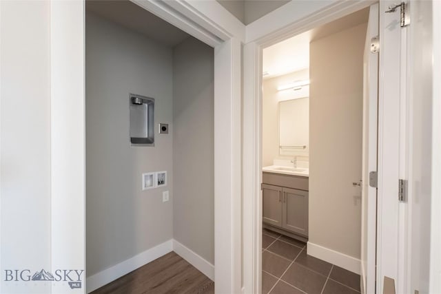 488 Meriwether Ave, Bozeman, MT 59718 - laundry room featuring hookup for an electric dryer, hookup for a washing machine, and dark tile patterned floors