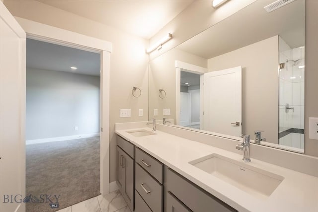 488 Meriwether Ave, Bozeman, MT 59718 - bathroom featuring double vanity, marble finish flooring, and a shower