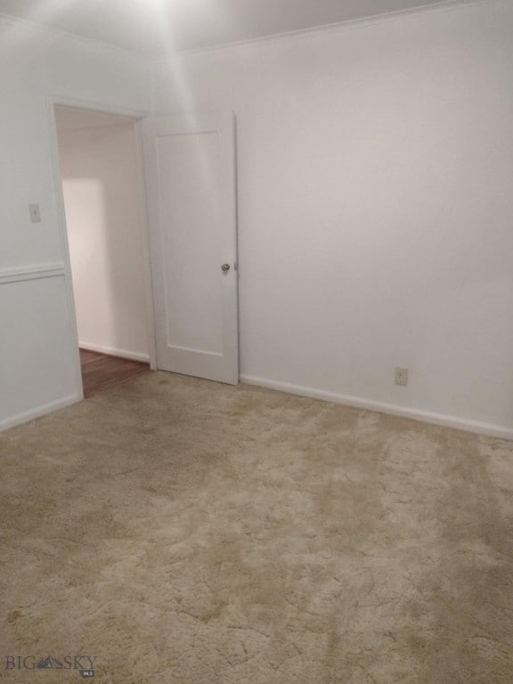 600 C St, Townsend, MT 59644 - unfurnished room with light carpet and crown molding