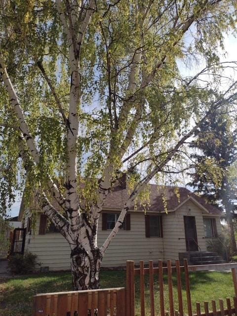 600 C St, Townsend, MT 59644 - view of front facade with a fenced front yard