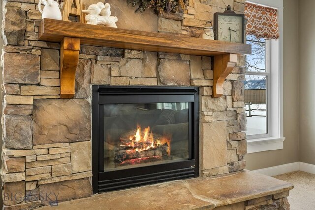605 E Cameron Brg, Bozeman, MT 59718 - detailed view of a stone fireplace and baseboards