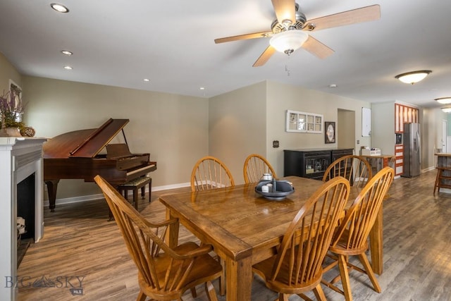 605 E Cameron Brg, Bozeman, MT 59718 - dining space with wood finished floors, a fireplace, recessed lighting, and ceiling fan