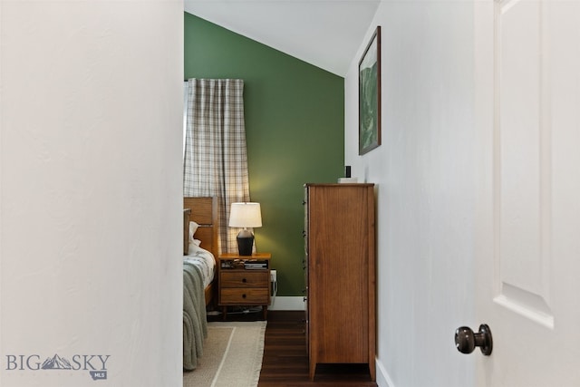 25 W Dooley Ln, Belgrade, MT 59714 - bedroom with vaulted ceiling and wood finished floors