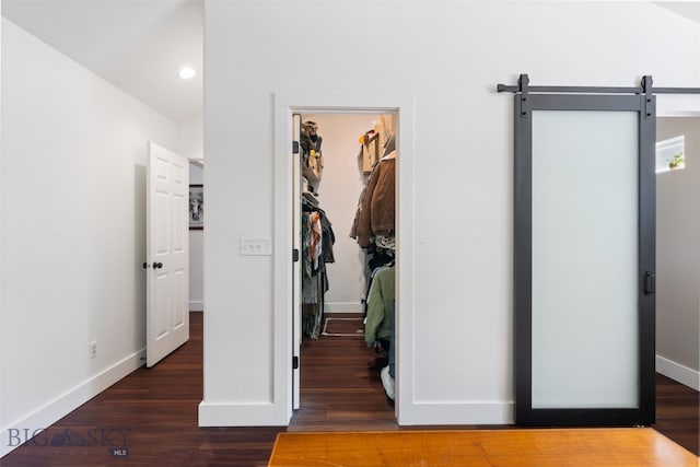 25 W Dooley Ln, Belgrade, MT 59714 - corridor featuring wood finished floors, a barn door, and recessed lighting