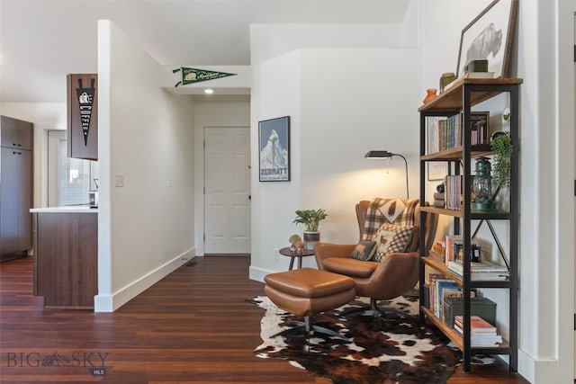 25 W Dooley Ln, Belgrade, MT 59714 - sitting room featuring dark wood-style flooring and baseboards