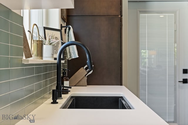 25 W Dooley Ln, Belgrade, MT 59714 - kitchen view of a sink and backsplash