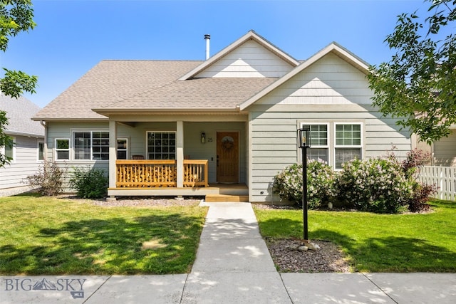 25 W Dooley Ln, Belgrade, MT 59714 - view of front facade featuring covered porch and roof with shingles