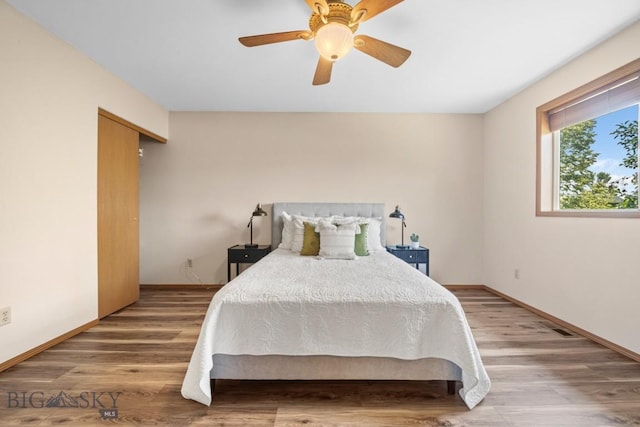 704 Mayfair Dr, Belgrade, MT 59714 - bedroom featuring wood finished floors and ceiling fan