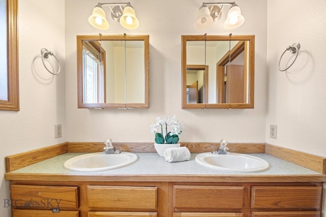 704 Mayfair Dr, Belgrade, MT 59714 - bathroom featuring double vanity