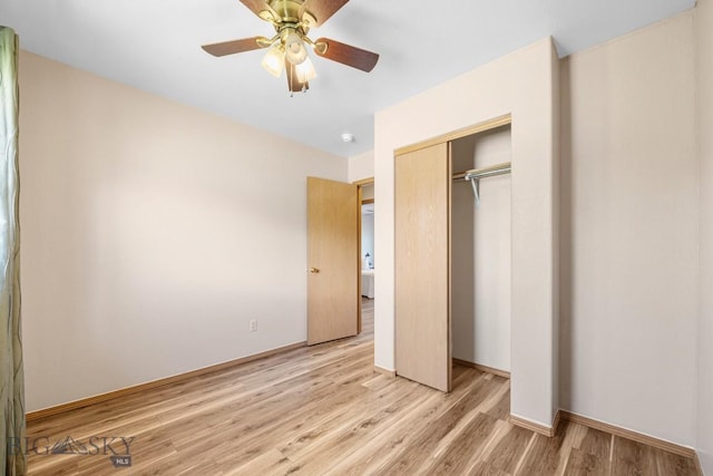 704 Mayfair Dr, Belgrade, MT 59714 - unfurnished bedroom featuring a closet, light wood finished floors, and ceiling fan