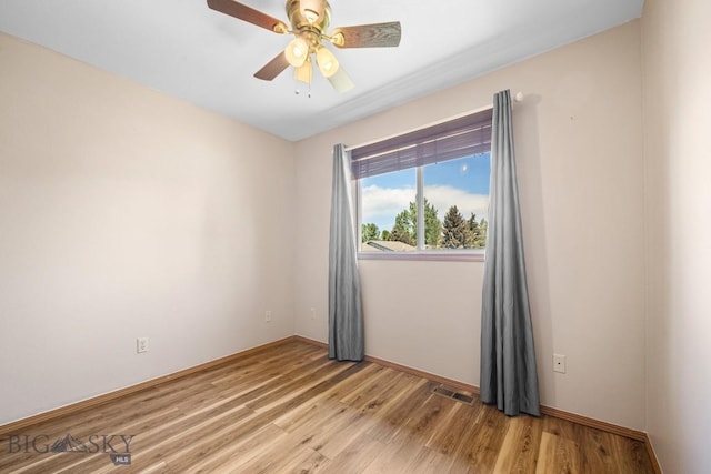 704 Mayfair Dr, Belgrade, MT 59714 - unfurnished room featuring light wood finished floors and ceiling fan