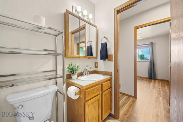 704 Mayfair Dr, Belgrade, MT 59714 - bathroom featuring vanity and wood finished floors
