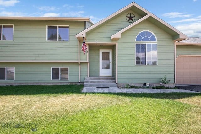 704 Mayfair Dr, Belgrade, MT 59714 - view of front of house featuring an attached garage, a front lawn, and entry steps