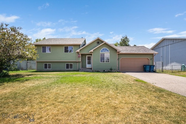704 Mayfair Dr, Belgrade, MT 59714 - split level home with a garage and asphalt driveway