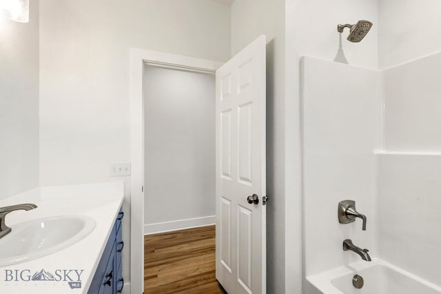 20 Hollow Top Trl, Three Forks, MT 59752 - full bath with bathtub / shower combination, wood finished floors, and vanity