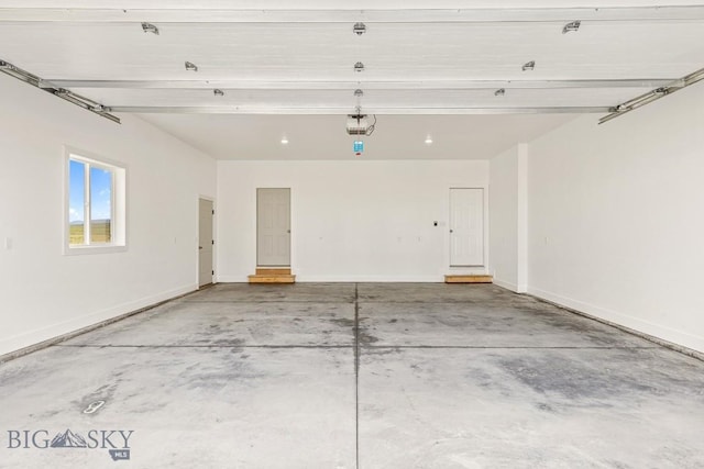 20 Hollow Top Trl, Three Forks, MT 59752 - garage featuring a garage door opener and baseboards