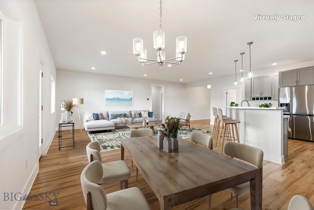20 Hollow Top Trl, Three Forks, MT 59752 - dining room featuring a chandelier, recessed lighting, and light wood-style floors