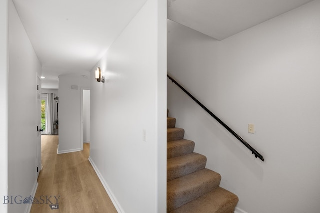 1203 Wineglass Ct Unit B, Livingston, MT 59047 - staircase featuring wood finished floors and baseboards