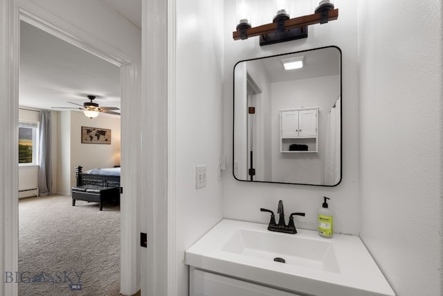 1203 Wineglass Ct Unit B, Livingston, MT 59047 - bathroom with a baseboard heating unit, vanity, and ceiling fan