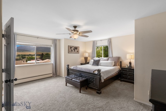 1203 Wineglass Ct Unit B, Livingston, MT 59047 - carpeted bedroom with a baseboard radiator and a ceiling fan