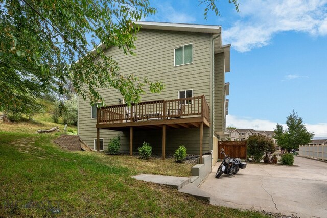 1203 Wineglass Ct Unit B, Livingston, MT 59047 - rear view of property with a deck and a patio area